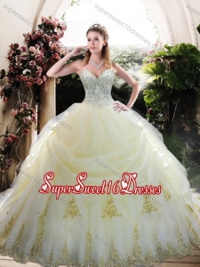 Custom Designed White Quinceanera Gown with Appliques and Beading
