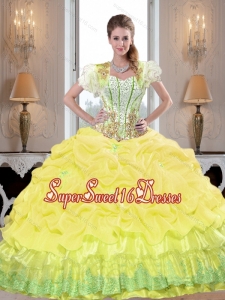 Fitting Yellow 2015 Sweet 16 Ball Gowns with Beading and Pick Ups for Summer