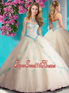 Elegant Beaded and Applique Tulle Quinceanera Dress in Champagne