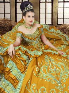 Satin Off The Shoulder Sleeveless Lace Up Embroidery Quinceanera Gowns in Gold